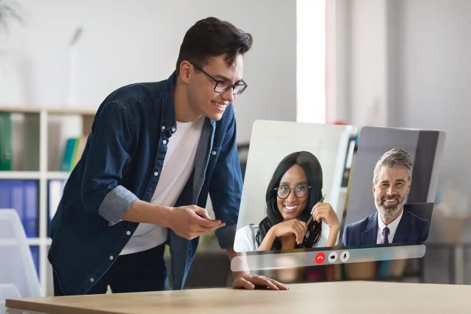 businessman engaging online conference call with diverse colleagues indoor 1 scaled